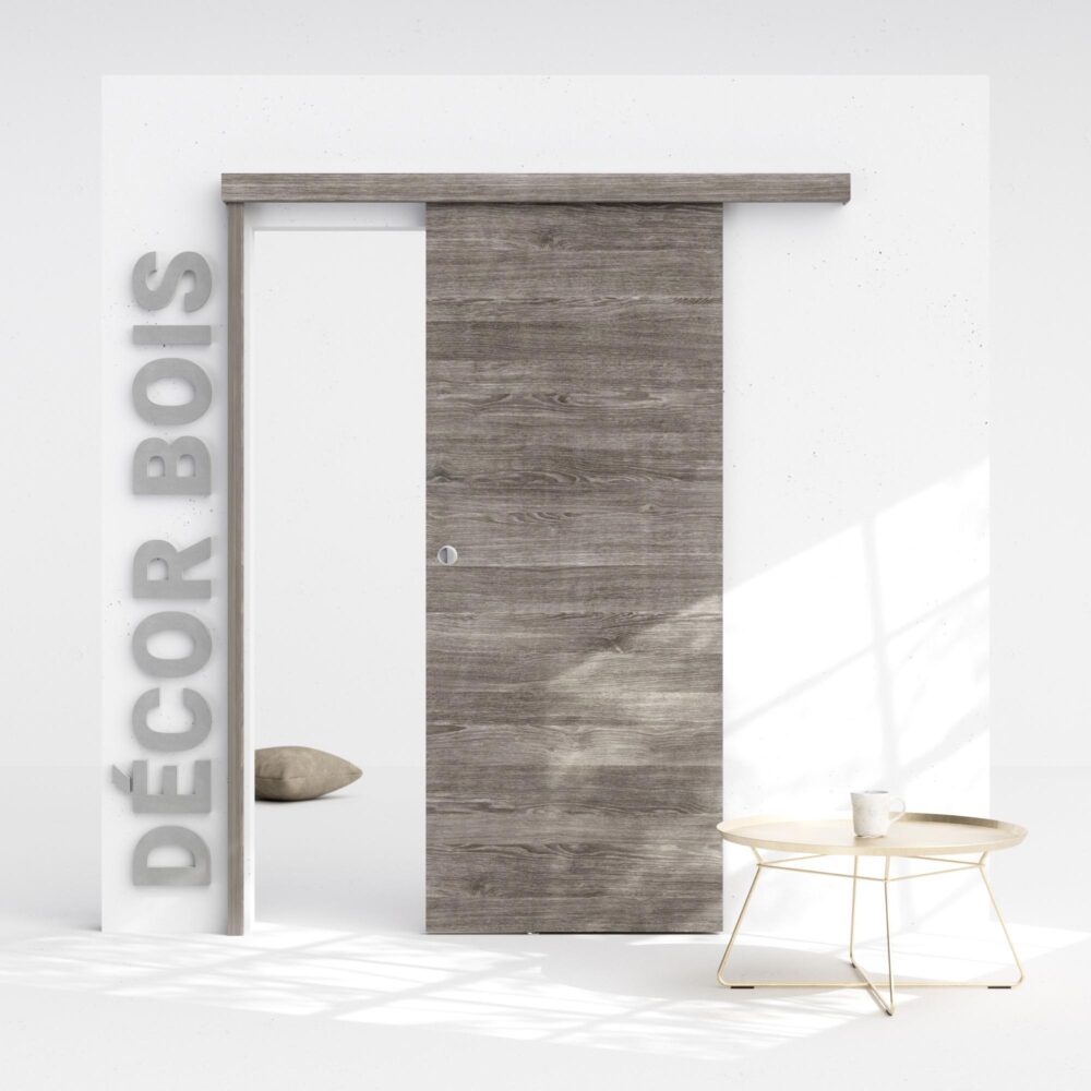 Kit porte coulissante - Visuel d'une porte coulissante avec rail et butée décor bois gris blanchi