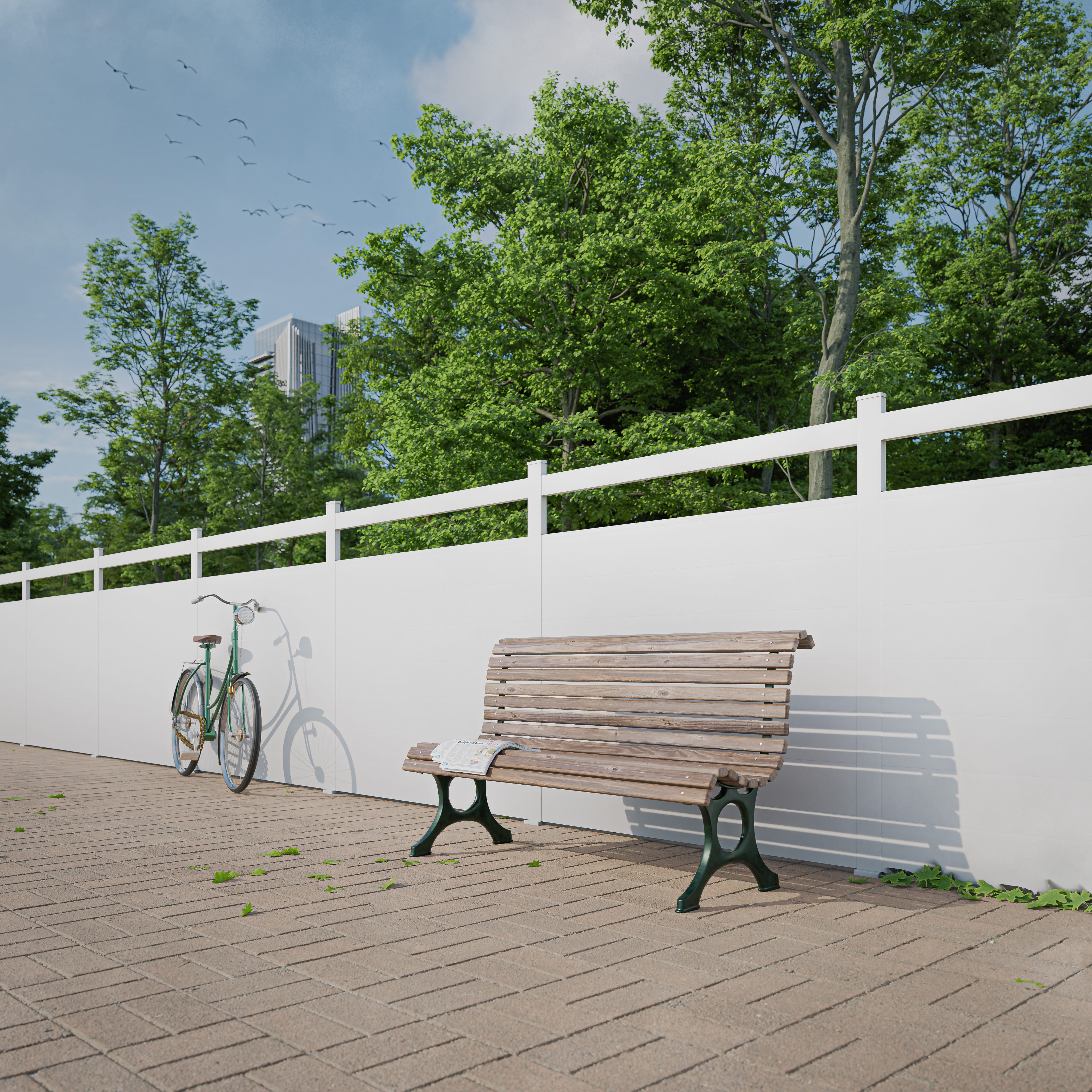 Quelle clôture choisir – une allée de jardin avec un banc et un vélo posé contre une clôture blanche