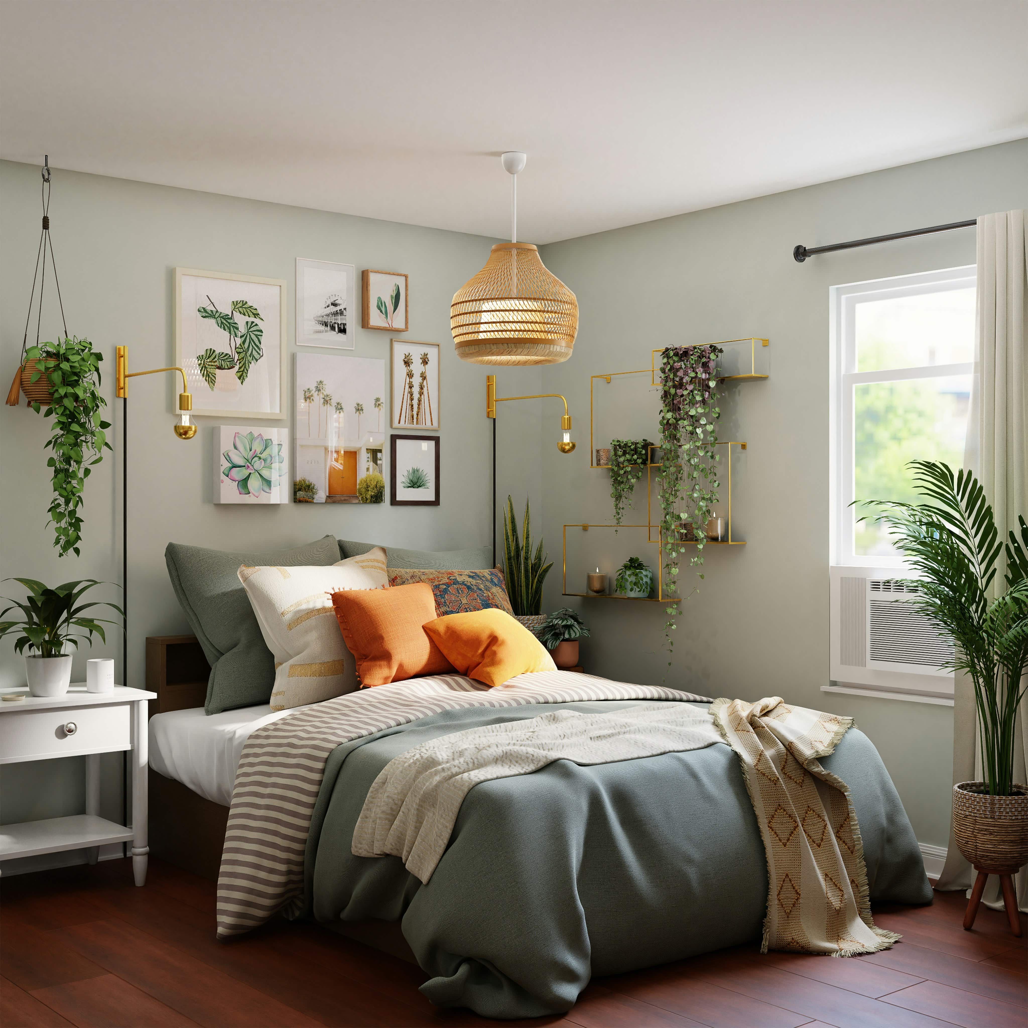 Décorer un mur blanc - Une chambre avec un grand lit et un mur décoré de cadres et de plantes